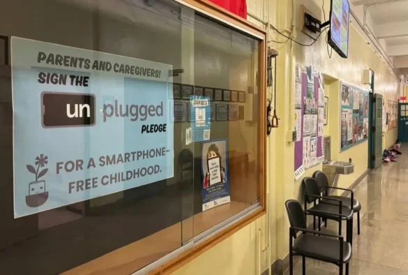 Unplugged Pledge sign for parents and caregivers promoting smartphone-free childhood.
